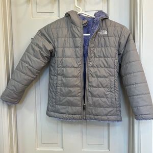 Purple and gray reversible North face fuzzy and puffer jacket.